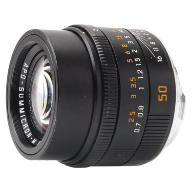 Leica 50mm APO-Summicron-M angled front view showing focus and aperture scales